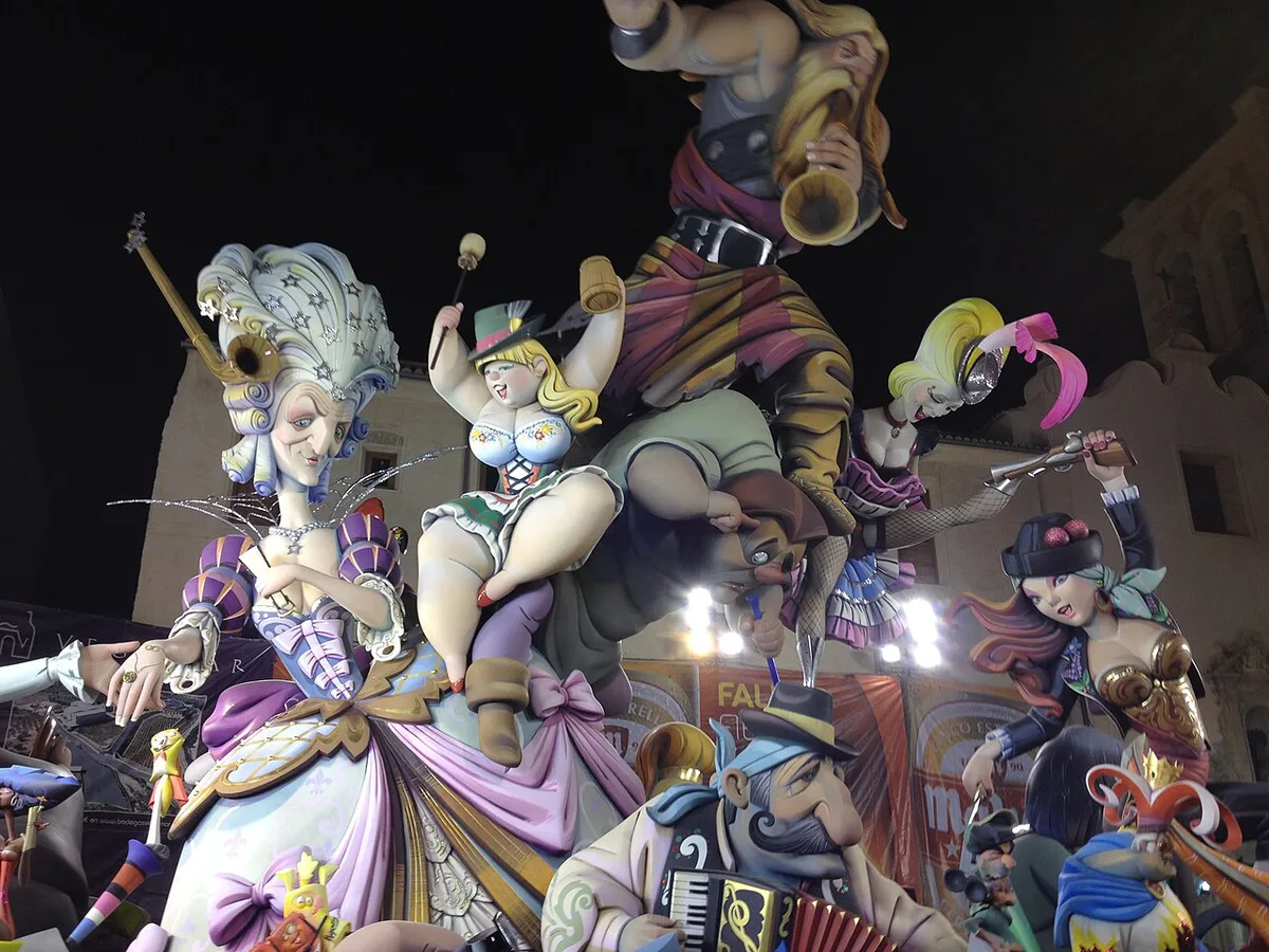 A towering painted Fallas monument in a Valencia square before the burning — 2